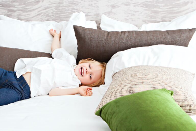 child on bed